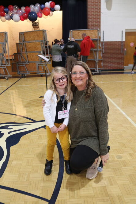 Teacher with young student